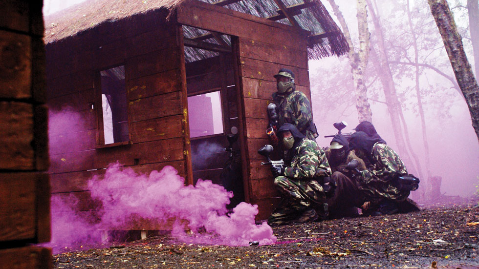 pink smoke grenade in paintball base